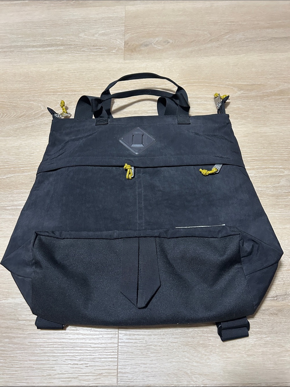The North Face Black Convertible Tote Backpack with Yellow Accents